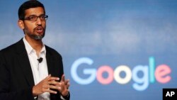 FILE - In this Wednesday, Jan. 4, 2017, file photo, Google CEO Sundar Pichai speaks during a news conference on Google's collaboration with small scale local businesses in New Delhi. 