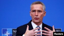 NATO Secretary-General Jens Stoltenberg speaks at a news conference following a NATO defense ministers meeting at the alliance headquarters in Brussels, Belgium, Feb. 12, 2020. 