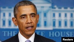 President Obama delivers remarks on the situation in Ukraine from the press briefing room at the White House in Washington February 28, 2014