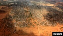 FILE - An aerial view shows makeshift shelters at the Dagahaley camp in Dadaab, near the Kenya-Somalia border in Garissa County, Kenya.