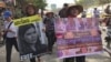 Protesters Call for Release of Detained Rights Workers, Election Official