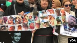 Mitinqdə nümayiş etdirilən işgəncə halları ilə bağlı plakat -19.01.2018 