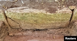 FILE - A view shows a part of an engraved stone after archaeologists from Mexico's National Institute of Anthropology and History (INAH) discovered an ancient Mayan city inside the Balamku ecological reserve in Campeche state, Mexico. (Mexico's National Institute of Anthropology and History/Handout via REUTERS)