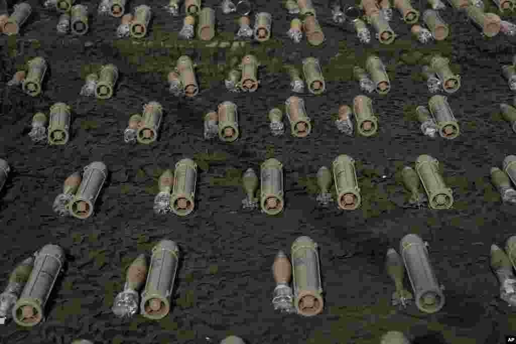 Weapons and other equipment said to belong to the Lebanese militant group Hezbollah and seized by the Israeli military in its ground invasion of southern Lebanon are displayed.