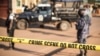 A crime scene following a bomblast last night is secured by the Ugandan police in Kampala, Oct. 24, 2021. 