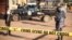 A crime scene following a bomblast last night is secured by the Ugandan police in Kampala, Oct. 24, 2021. 