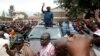 Kenyan opposition leader Raila Odinga, of the National Super Alliance (NASA) coalition, waves to supporters as he leaves the St. Stephen's cathedral after attending a church service in Nairobi, Sept. 3, 2017.