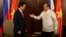 Philippines' President Benigno Aquino (R) prepares to shake hands with Vietnam's Prime Minister Nguyen Tan Dung during during their meeting at the Malacanang Presidential Palace in Manila, May 21, 2014.