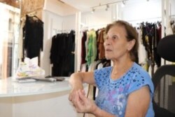 Mouneera Sa'ad's dress shop has nearly been run out of business by the nearby demonstrations, but she says she understands the anger. Pictured in Beirut on Nov. 14, 2019. (Heather Murdock/VOA)