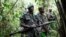 FILE - Democratic Republic of Congo military personnel (FARDC) patrol against the Allied Democratic Forces (ADF) and the National Army for the Liberation of Uganda (NALU) rebels near Beni in North-Kivu province.
