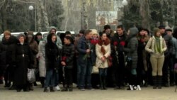 Ukrainian City Honors Rocket Attack Victims as Shaky Cease-Fire Comes Into Effect