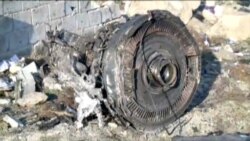 One of the engines of Ukraine International Airlines flight PS752, a Boeing 737-800 plane that crashed after taking off from Tehran's Imam Khomeini airport on Jan. 8, 2020, is seen in this still image taken from Iran Press footage.