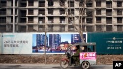 یک آپارتمان ناتمام در شهر پکن، چین (آرشیو)