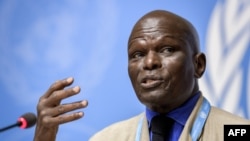 Doudou Diene, chairman of the U.N. Commission of Inquiry on Burundi, speaks during a press conference to present a fresh report on rights violations in the country, Sept. 4, 2019, in Geneva.