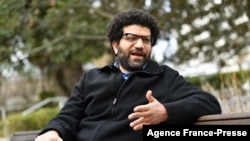 FILE - Sherif Mansour, summoned at age 17 to speak to Egyptian security, says his father described how to handle the interrogation, during an interview with AFP, Chevy Chase, Maryland, February 23, 2021. 