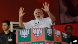 FILE - Indian Prime Minister Narendra Modi, pictured at an election rally of his party in Kolkata in April 2016, says Pakistanis should question why their nation "exports terrorists" to the rest of the world. 