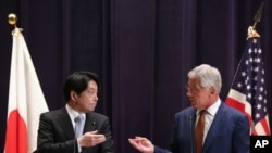 美国国防部长哈格尔和日本防务大臣小野寺五典在记者会上