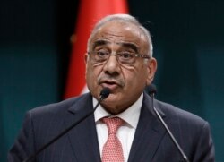 FILE - Iraqi Prime Minister Adel Abdul Mahdi speaks to the media during a joint news conference with Turkish President Recep Tayyip Erdogan, in Ankara, Turkey, May 15, 2019.