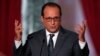 French President Francois Hollande attends his news conference at the Elysee Palace in Paris, Sept. 7, 2015. 