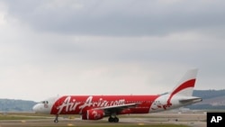 Pesawat AirAsia Airbus A320-200 di KLIA2, Sepang, Malaysia, 26 November 2014. (Foto: dok. AP)
