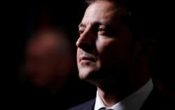 FILE - Ukraine's President Volodymyr Zelenskiy attends a luncheon for world leaders at the 74th session of the United Nations General Assembly at U.N. headquarters in New York, Sept. 24, 2019.