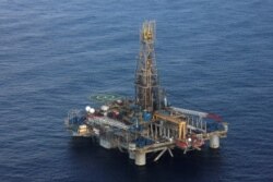 FILE - A view of the Homer Ferrington gas drilling rig, operated by Noble Energy and drilling in an offshore block on concession from the Cypriot government, in the east Mediterranean.