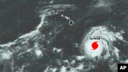 This NASA satellite imagery shows Hurricane Lane in the Central Pacific Ocean southeast of the Hawaiian Islands at 2:01 p.m. HST (21:01 GMT) , Aug. 20, 2018.