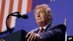 U.S. President Donald Trump suggests, Sept. 23,2019, that he raised former Vice President Joe Biden and Biden's son in a summer phone call with Ukraine's new leader.