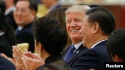 U.S. President Donald Trump and China's President Xi Jinping attend a state dinner at the Great Hall of the People in Beijing, China, Nov. 9, 2017. 