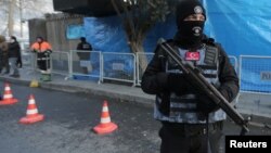 Turkish police stand guard outisde the Reina nightclub by the Bosphorus, which was attacked by a gunman, in Istanbul, Turkey, Jan. 1, 2017. 