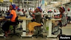FILE - Workers sew clothes inside the Indochine Apparel textile factory in Hawassa Industrial Park in Southern Nations, Nationalities and Peoples region, Ethiopia November 17, 2017. (REUTERS/Tiksa Negeri/File Photo)