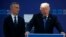 NATO Secretary General Jens Stoltenberg listens as President Donald Trump speaks during a ceremony to unveil artifacts from the World Trade Center and Berlin Wall for the new NATO headquarters in Brussels, May 25, 2017. 