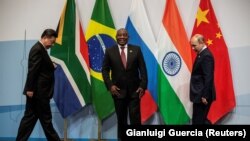 South Africa's President Cyril Ramaphosa, China's President Xi Jinping and Russia's President Vladimir Putin, at the BRICS summit meeting in Johannesburg, South Africa, July 26, 2018. (Gianluigi Guercia/Reuters)