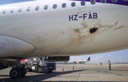 This image provided by Saudi Arabia's Ministry of Media reportedly shows the damaged hull of an Airbus aircraft at Abha International Airport. A civilian plane was engulfed in flames February 10 after Yemen's Houthi rebels launched a drone strike.