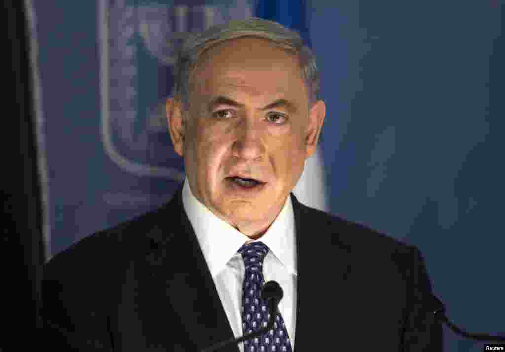 Israeli Prime Minister Benjamin Netanyahu speaks during a joint news conference with German Foreign Minister Frank-Walter Steinmeier (not pictured), in Tel Aviv, July 15, 2014.