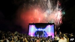 El Salvador's President Nayib Bukele participates in the closing ceremony of a congress for cryptocurrency investors in Santa Maria Mizata, El Salvador, Nov. 20, 2021.