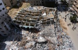 An aerial view of the destroyed building housing the offices of The Associated Press and other media, after it was hit last week by Israeli airstrikes, in Gaza City, May 22, 2021.