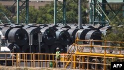 FILE - A worker is pictured at a steel plant in Monterrey, Mexico, Aug. 27, 2018.