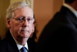 FILE - Senate Majority Leader Mitch McConnell (R-KY) speaks to the media after the weekly policy luncheons on Capitol Hill in Washington, Dec. 3, 2019.