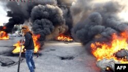 Bing'ozida ahvol notinch. 2014-yil fervalda ikki politsiyachi o'ldirilganidan keyin olingan surat