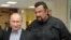Russia -- President Vladimir Putin and American action movie actor Steven Seagal visit a newly-built sports complex of Sambo-70 prominent wrestling school in Moscow, March 13, 2013