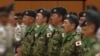 As Japan Pushes Forward Expanded Defense Bill, Protests Follow