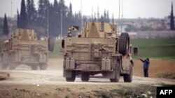 Des soldats américains sur les routes de Minbej, en Syrie, le 3 mars 2017.