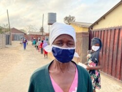 Sixty-six year-old Maria Paruwe is one of those benefiting from the $3-a-month government grant. She depends on Samantha’s relief kitchen. (Columbus Mavhunga/VOA)