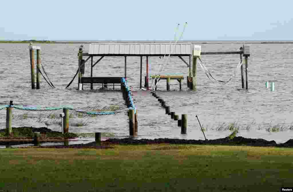 A dock is seen underwater a day before Hurricane Michael comes ashore in Carrabelle, Florida, Oct. 9, 2018. 