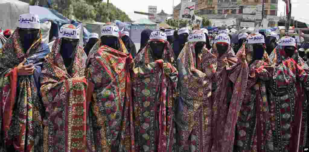 June 25, 2011: Yemeni women, wearing headbands that read in Arabic, &quot;Housewives,&quot; participate in a demonstration in Sanaa, demanding the resignation of President Ali Abdullah Saleh. Women have been fighting to keep a voice for their rights sound