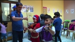 Iraqi Kids Find Refuge in Music