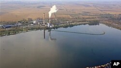 An aerial view of the reservoir storing chemical waste of Bokod thermal power station, 87 kms northwest of Budapest, Hungary, as an aerial surveillance of reservoirs throughout Hungary is performed in the aftermath of the toxic red mud flood disaster that