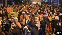 FILE - People protest for an independent news service against the pro-government media coverage of the state television network, in front of its headquarters in Budapest, Hungary, on Nov. 4, 2022. 