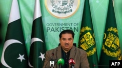 Pakistan's Energy Minister Khurram Dastgir speaks at a press briefing following a nationwide power outage, in Islamabad, Jan. 24, 2023.